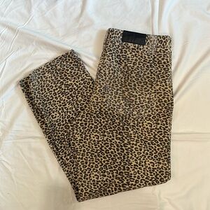 Cheetah print corduroys. Faded wash and baggy fit.
